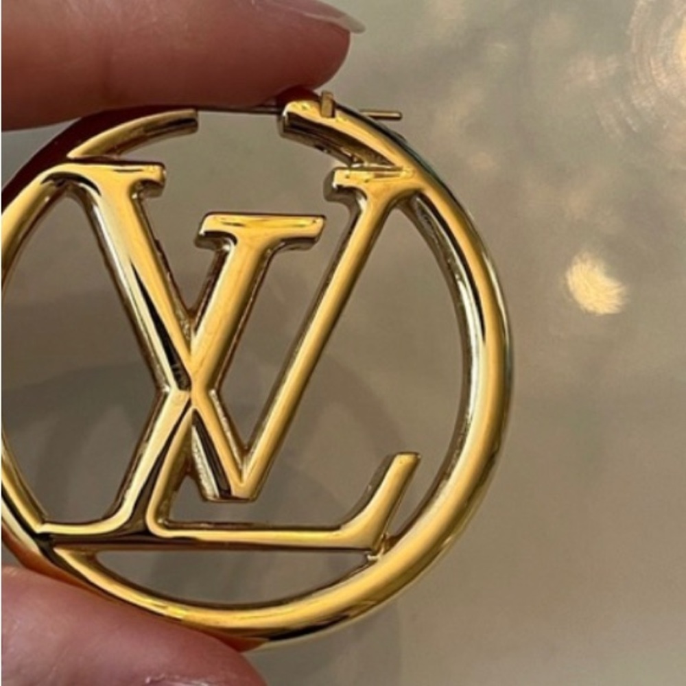 Pair of Louis Vuitton gold tone hoop earrings
